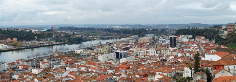 Rooftops of downtown Coimbra and the Mondego river